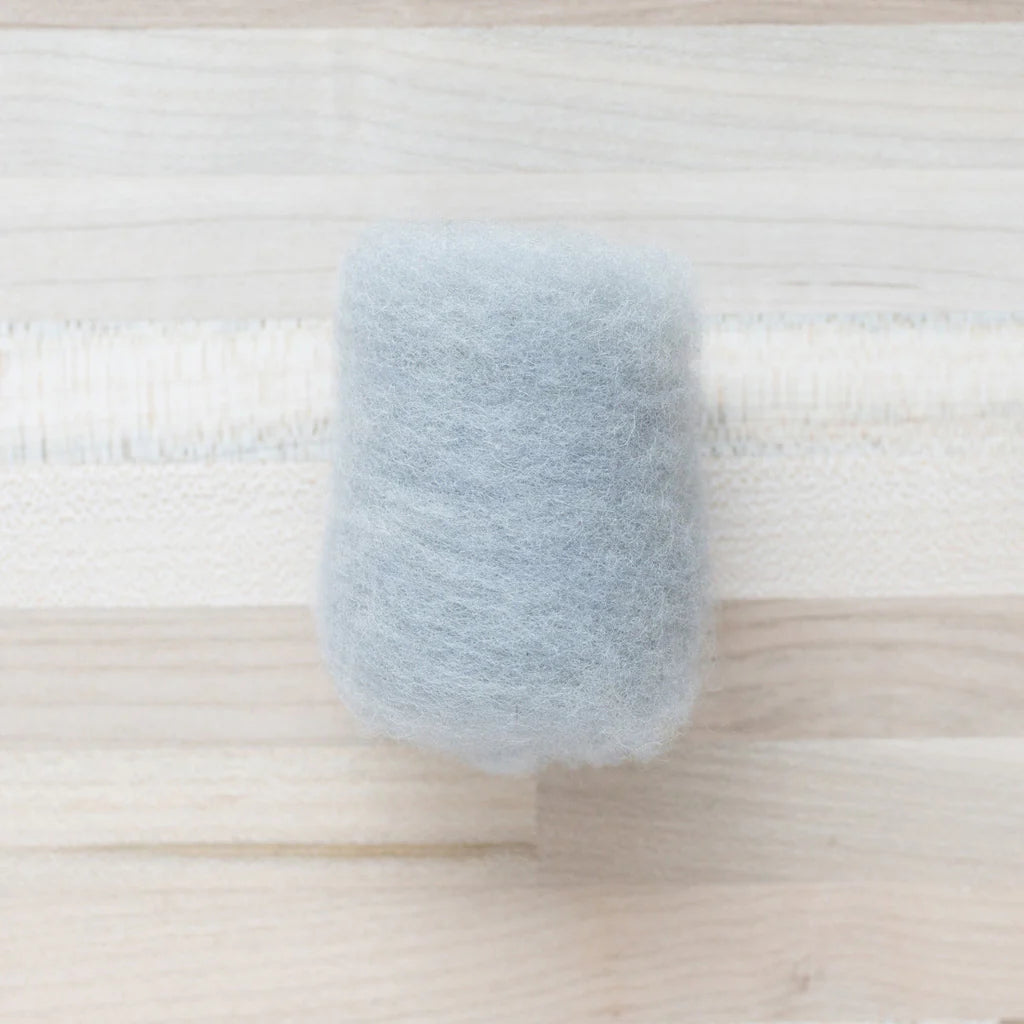 Baby Elephant Wool Batting by Felted Sky on a Tabletop