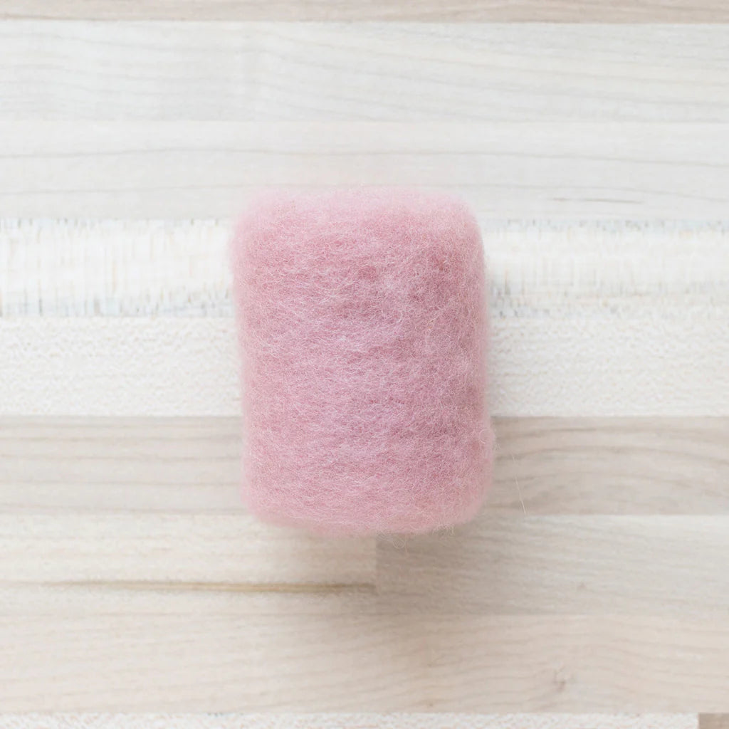 Dusty Rose Wool Batting by Felted Sky on a Tabletop