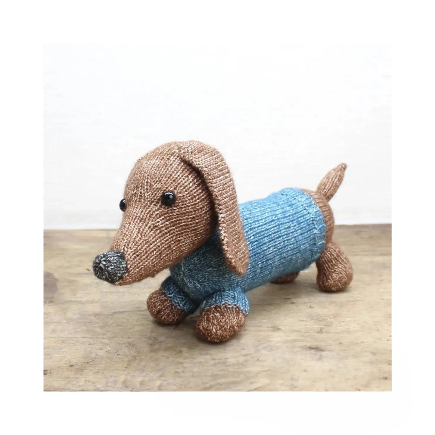 Handmade soft toy dachshund in blue sweater made from knitting kit - Alder & Alouette