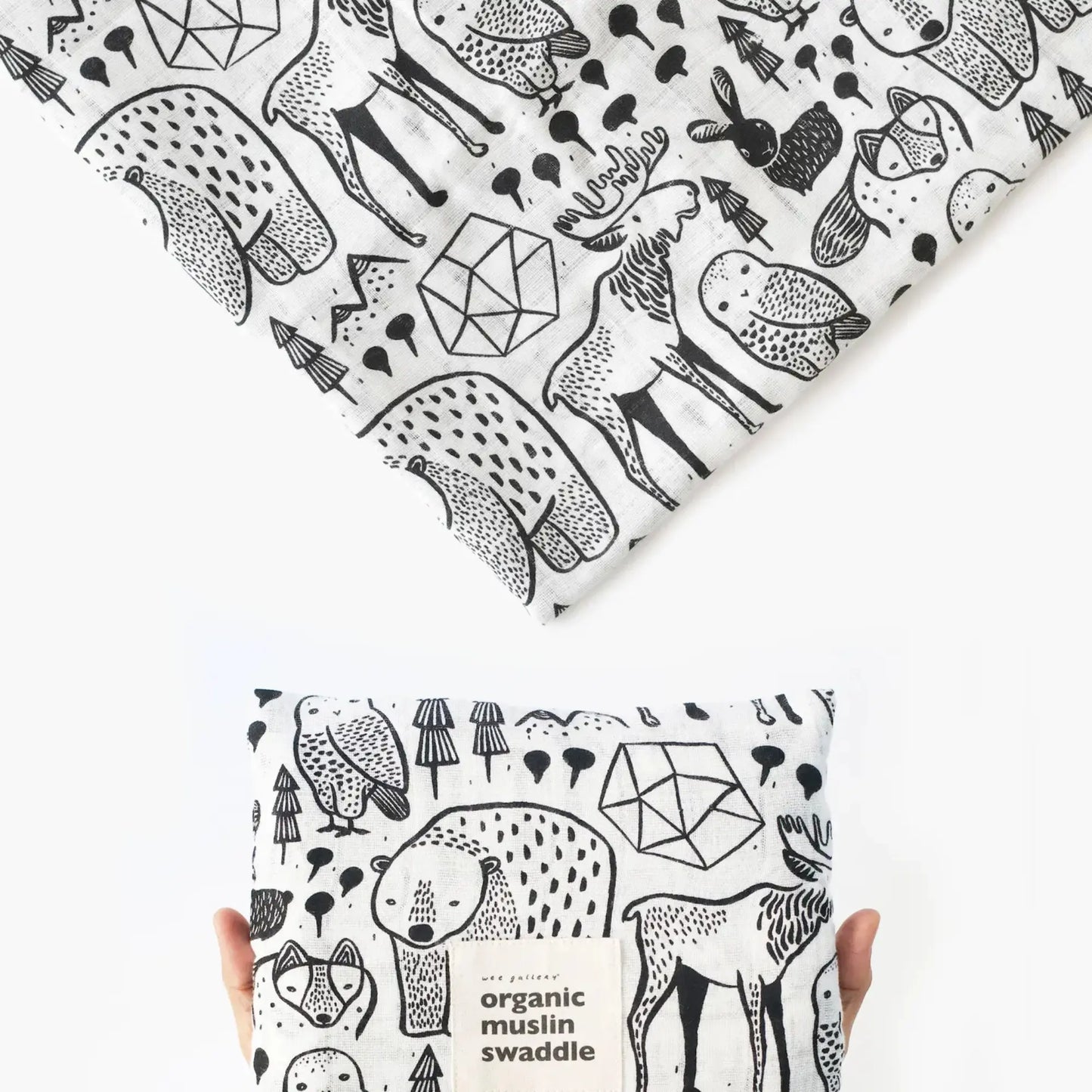 Organic muslin swaddle with black and white animal pattern show folded in hands and as a corner section