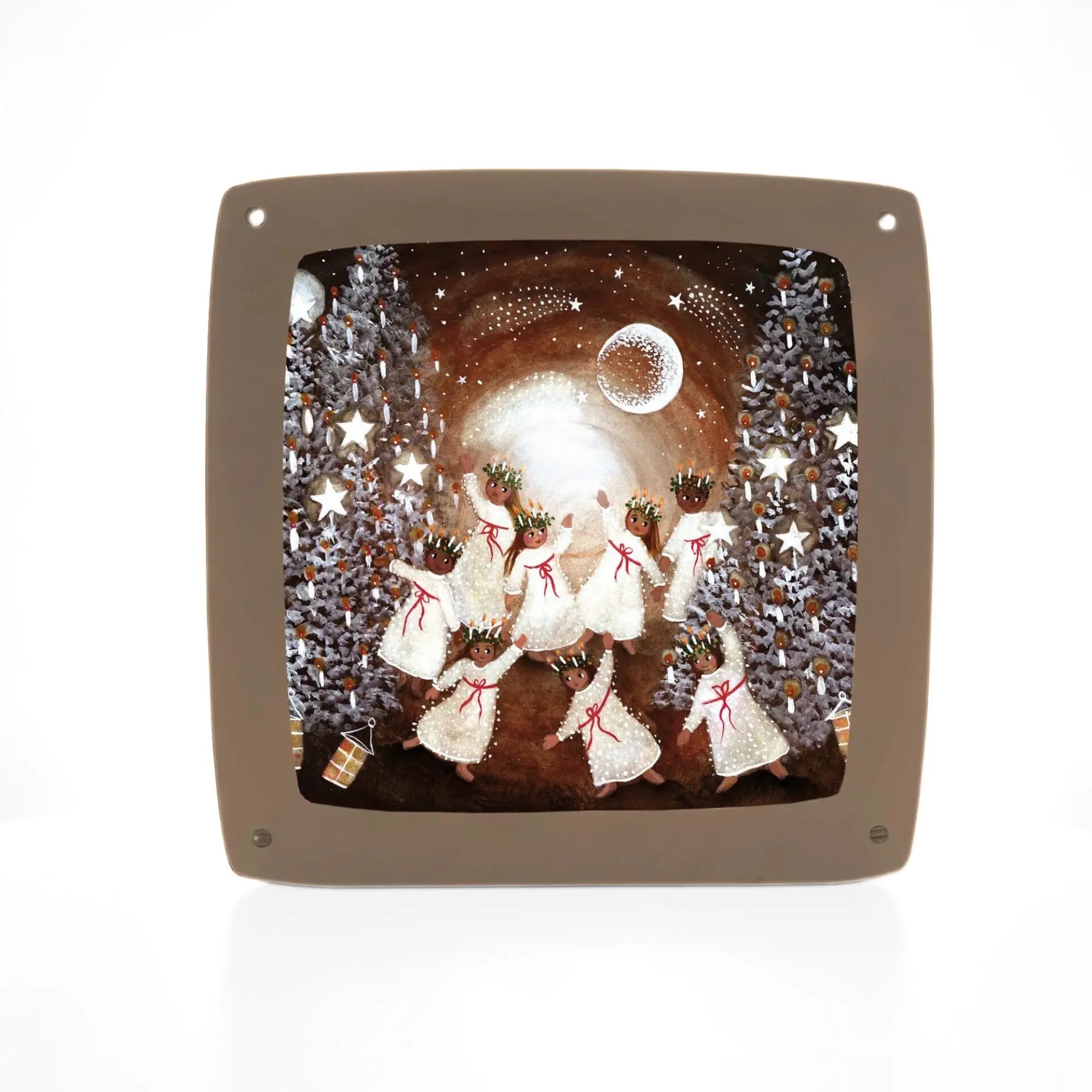 Toverlux lamp plate in a wooden lamp featuring a Saint Lucia Festival of Light winter scene with trees and snow