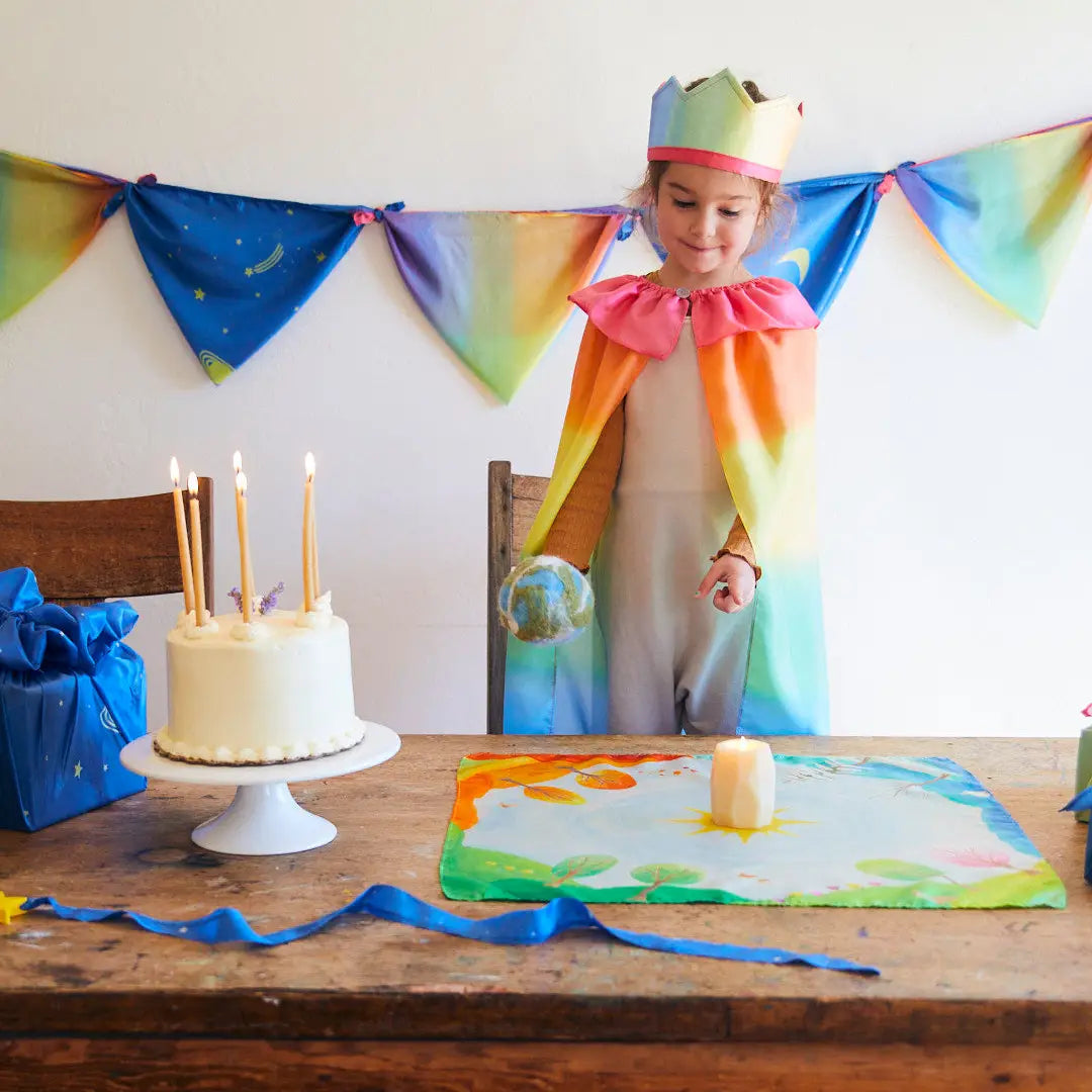 Around the World Mini Playsilk Showing the four seasons with candle in middle and birthday cake