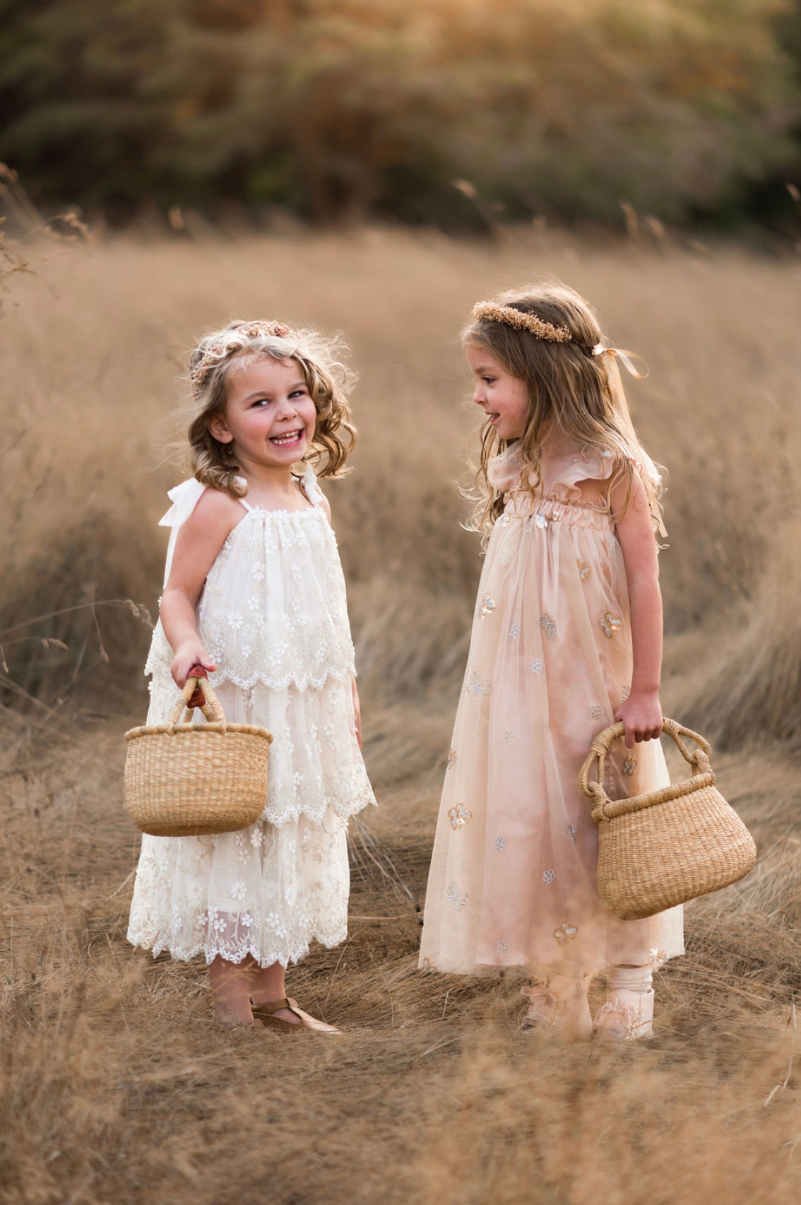 Baby Bolga Basket and kettle basket and two girls in a meadow - Alder & Alouette