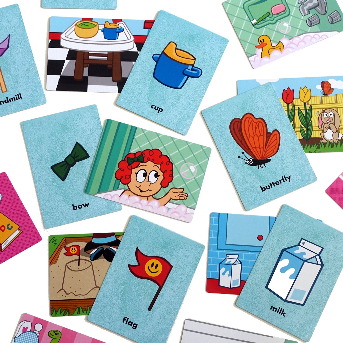 First Game:  Uh Oh! At Home cards spread out over white background