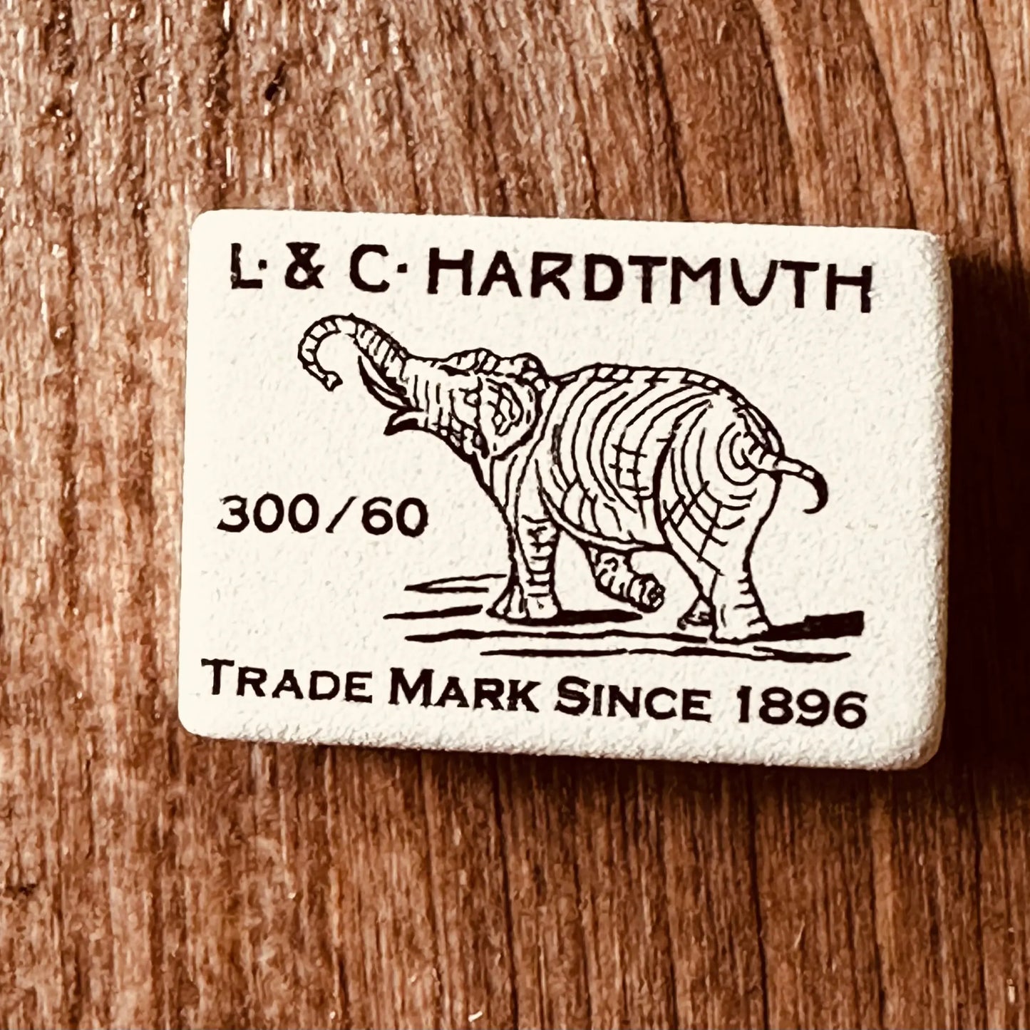 One Natural Rubber Eraser by Koh-I-Noor Hardtmuth with their trademark elephant and logo front