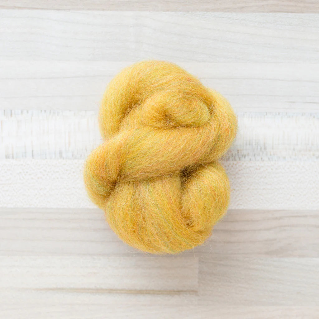 Butterscotch Yellow Wool Roving Felter's Flowing on tabletop