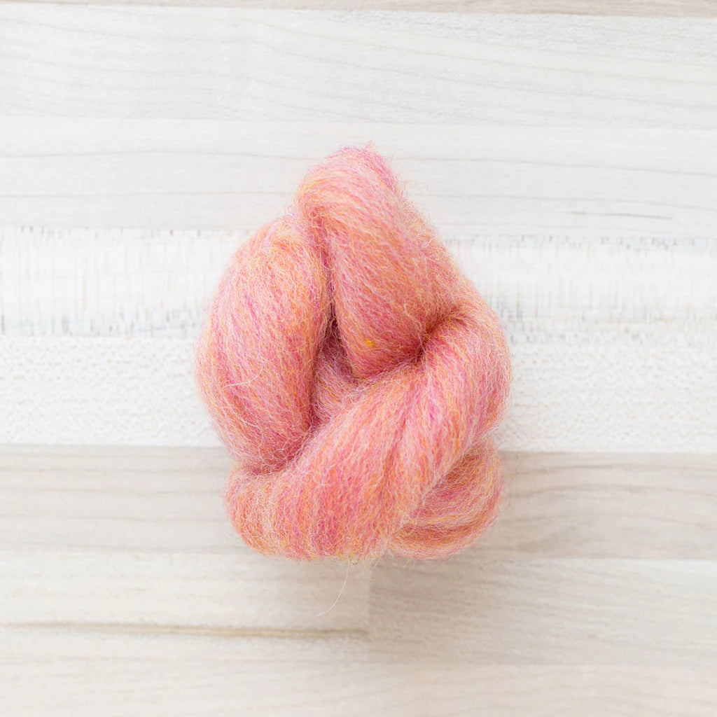 Grapefruit Wool Roving Felter's Flowing on tabletop
