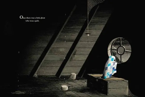 Dark attic with a quilted ghost looking out a round window