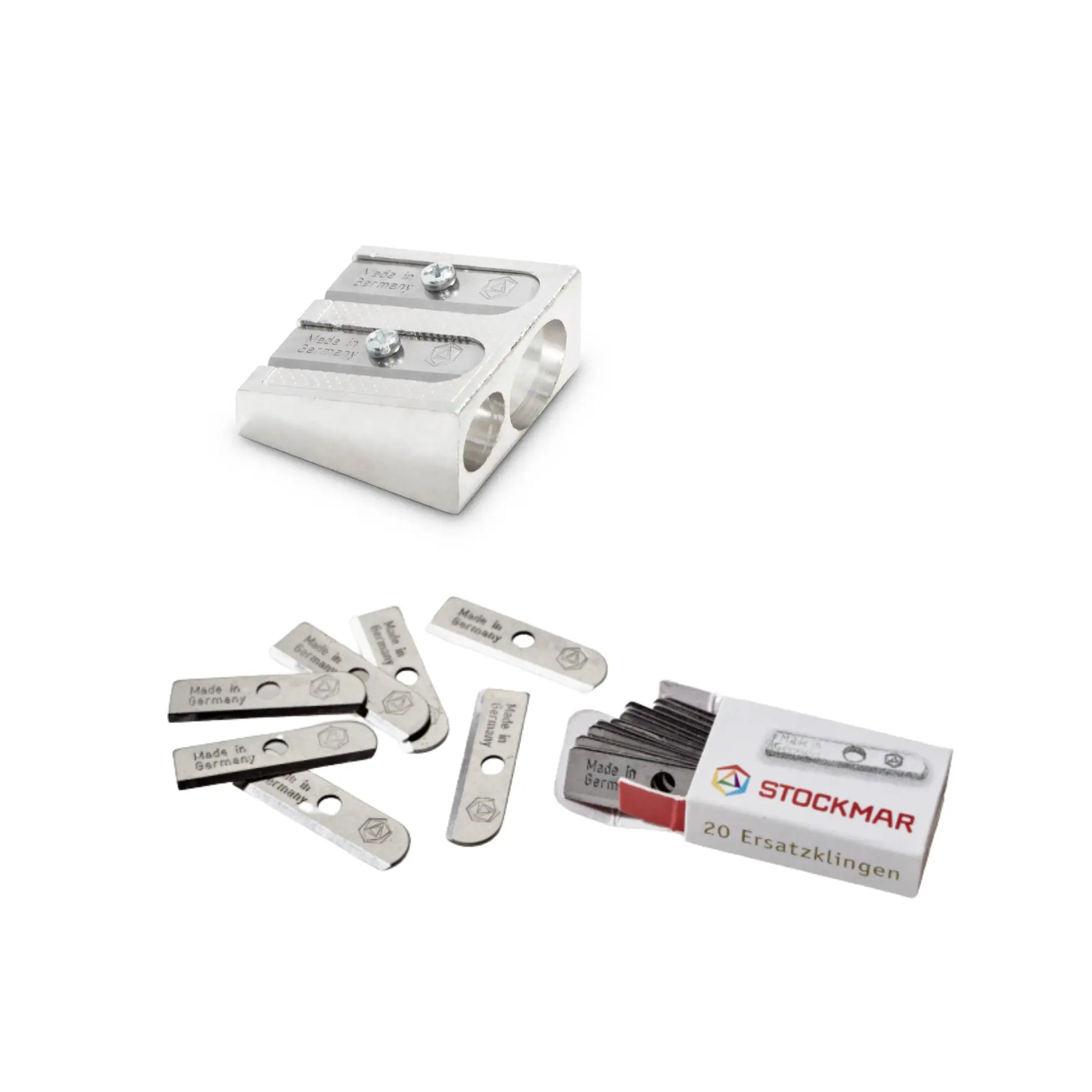 Stockmar metal dual pencil sharpener with two hole sizes and a box of replaceable blades
