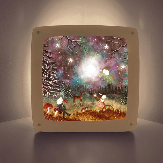 Decorative light box with a forest scene featuring a deer and fairy, glowing softly.